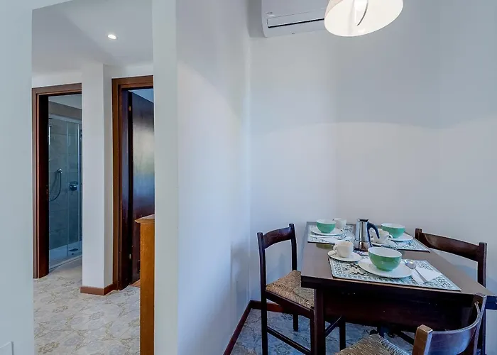 Apartamento Guesthost - Portosole Attic - With Terrace And Private Parking *