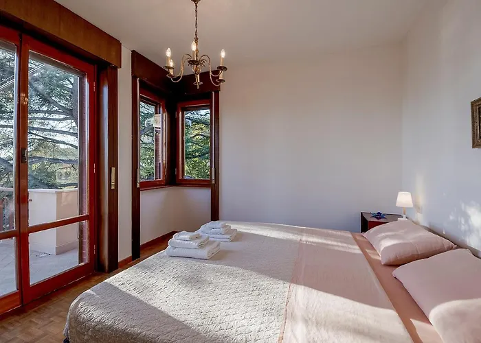 Apartamento Guesthost - Portosole Attic - With Terrace And Private Parking