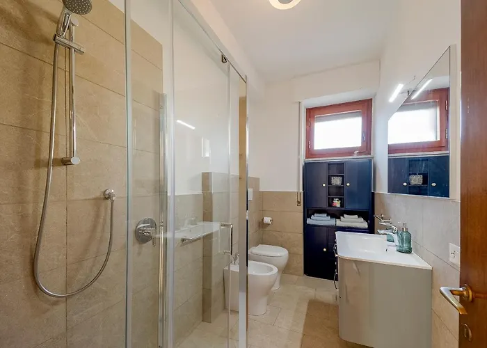 Guesthost - Portosole Attic - With Terrace And Private Parking